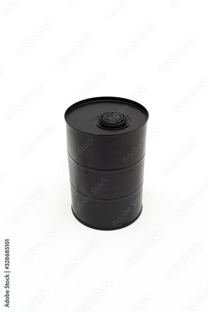a black barrel of oil on a white background. Ecology and environment. The problem of oil pollution. The oil crisis, the fall in oil prices a black barrel of oil on a white background. Ecology and environment. The problem of oil pollution. The oil crisis, the fall in oil prices