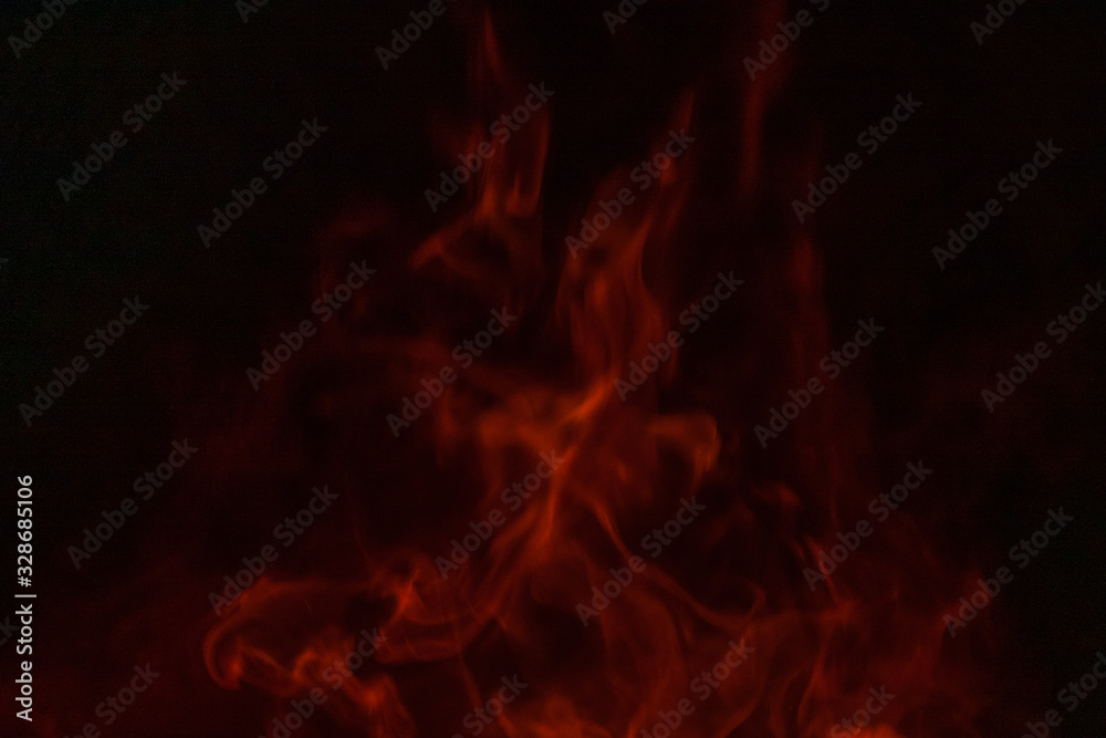 Texture of fire. Orange bright flame. Photo of a burning bonfire in a fire.