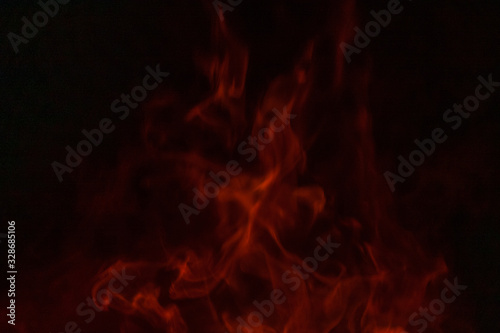 Texture of fire. Orange bright flame. Photo of a burning bonfire in a fire.