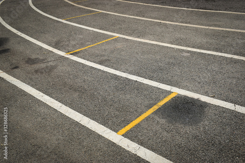 black tarmac asphalt of running track  athletic sport background