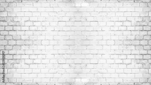 White painted damaged rustic brick wall texture background