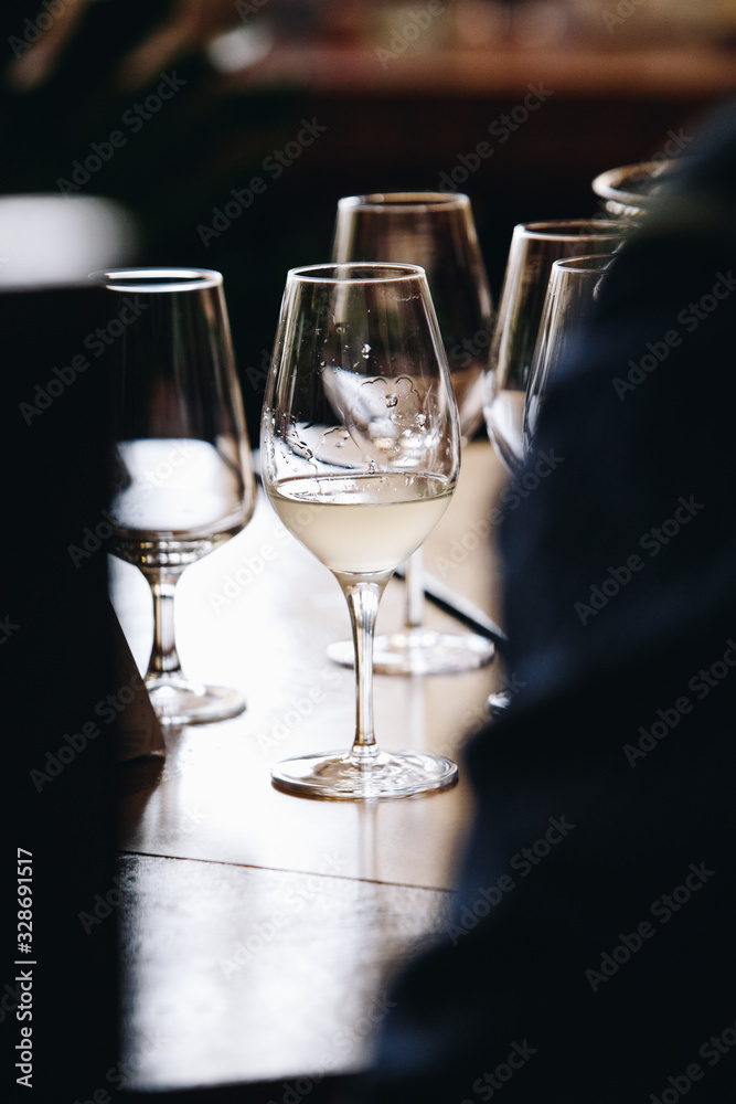 White and rose wine tasting close up view. Drop wine carafe.