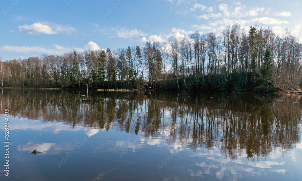 the view of the calm lake, the blue sky