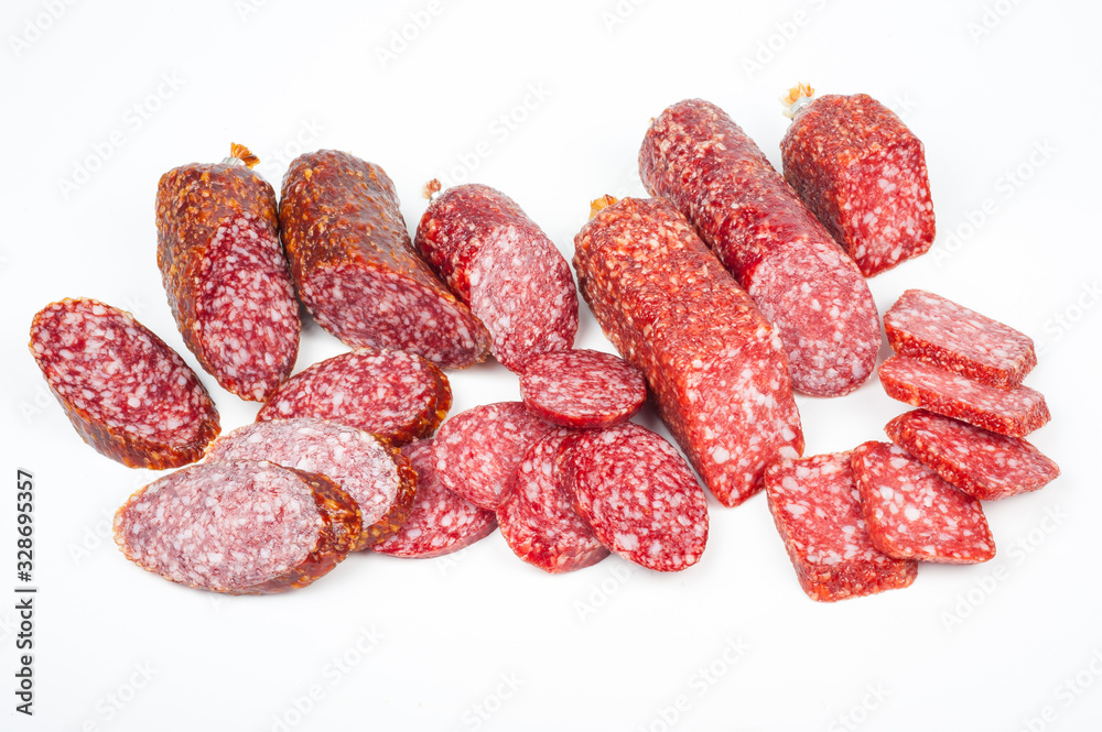 Smoked sausage in assortment on a white background Smoked sausage in assortment on a white background
