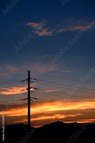 Electric poles in the setting sun