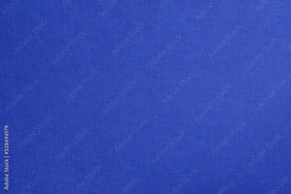 Blue dense canvas texture. Textile background.