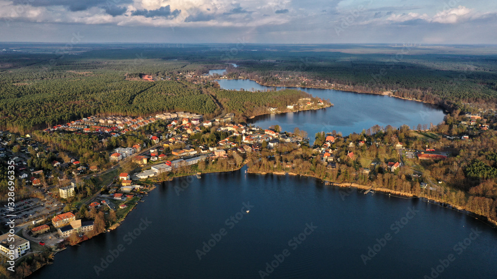 Aerial view of the town of Grünheide where nearby the Tesla Gigafactory is being constructed 