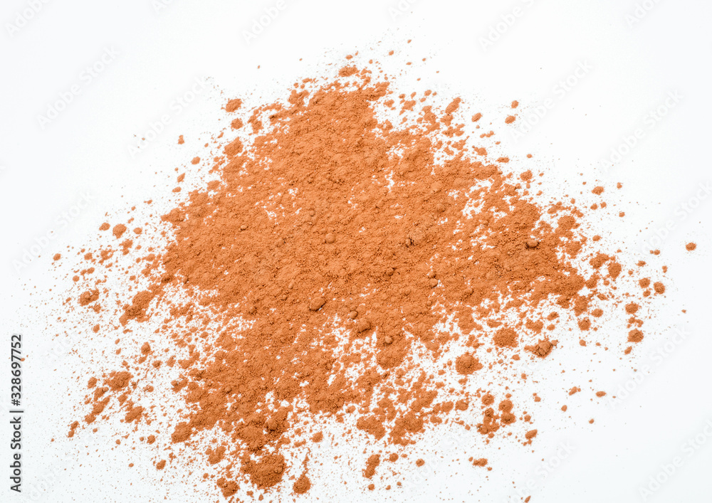 Pile cocoa powder on white background