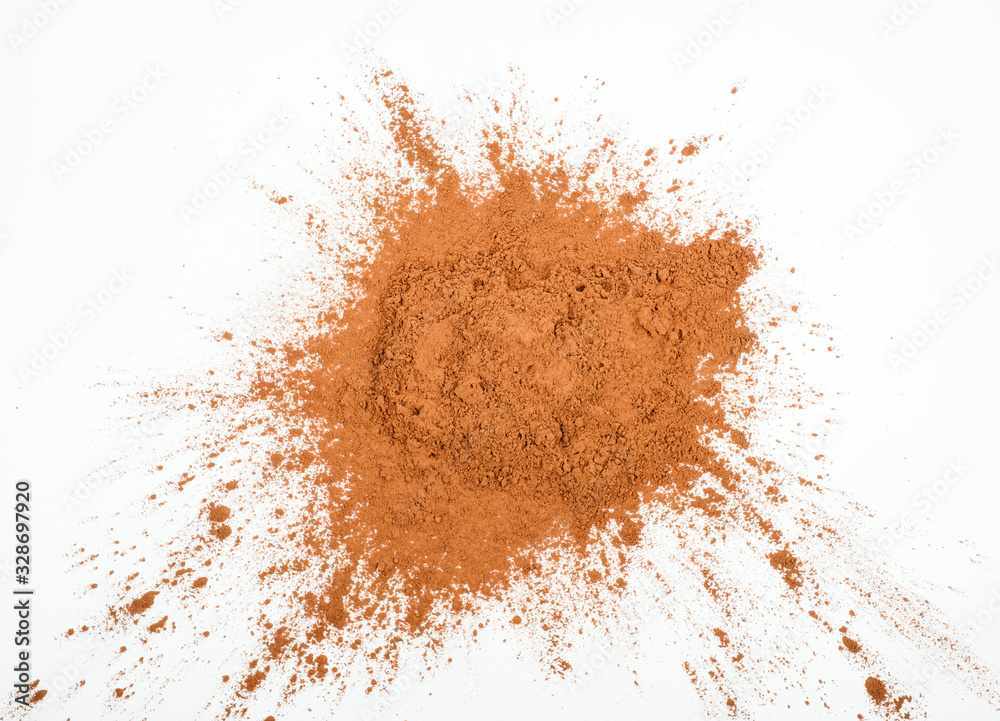 Pile cocoa powder on white background Pile cocoa powder on white background