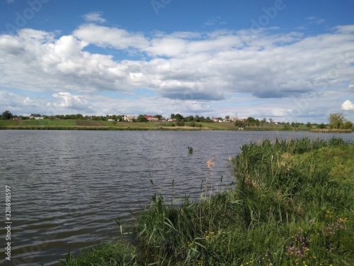 landscape with lake and blue sky