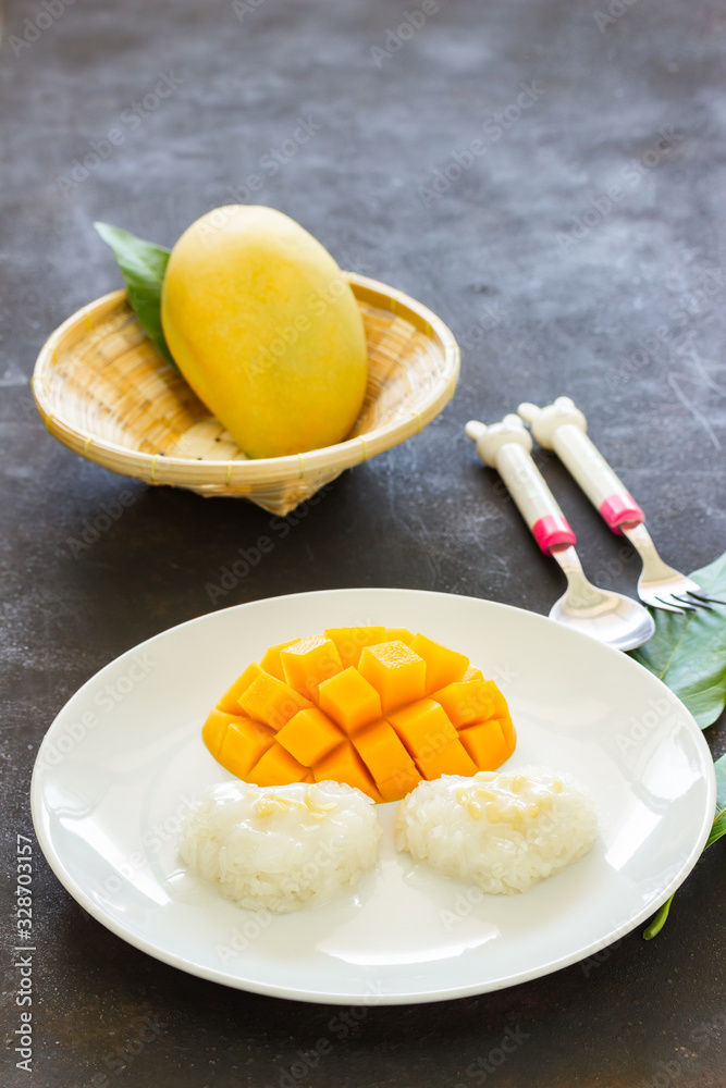 Ripe mango slice and sticky rice white plate Ripe mango slice and sticky rice white plate
