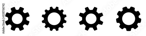 Gear set. Black gear wheel icons on white background - stock vector. photo
