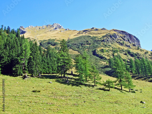 View of the picturesque peaks of the Ratikon border alpine mountain massif or Rätikon Grenzmassiv (oder Raetikon), Mainfeld - Canton of Grisons (Graubünden or Graubuenden), Switzerland photo