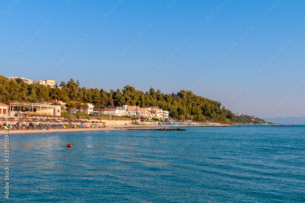 Kallithea, Greece - September 03,2019: Kalithea Beach (Greek: Παραλία Καλλιθέα) the most beautiful beach in Kallithea, Halkidiki in Greece.