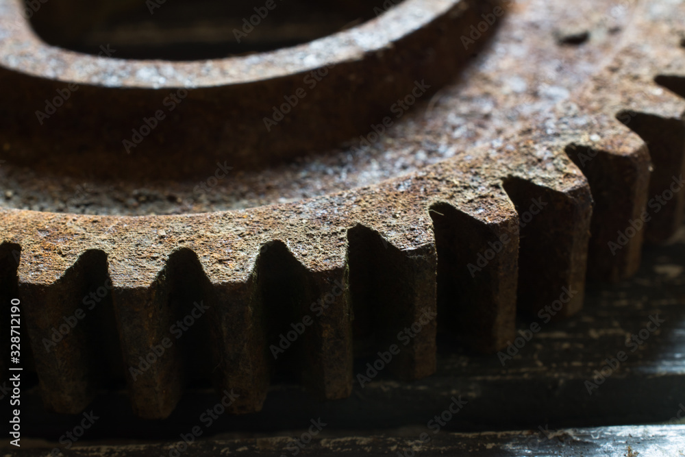 Rusty gears from old mechanism photographed at close range. Rusty gears from old mechanism photographed at close range.