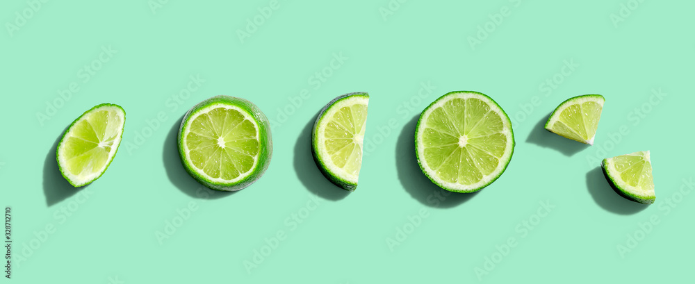Fresh green limes overhead view - flat lay Fresh green limes overhead view - flat lay