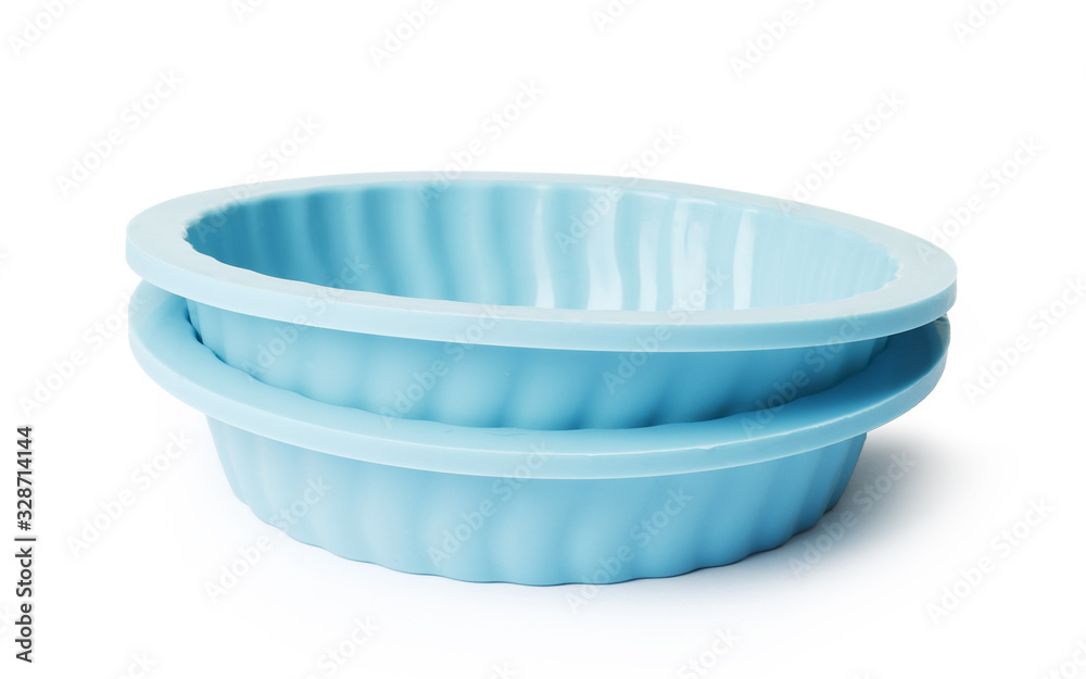 silicone mold for baking on a white background. Culinary accessories of the baker. Small baking cups. It is isolated. silicone mold for baking on a white background. Culinary accessories of the baker. Small baking cups. It is isolated.