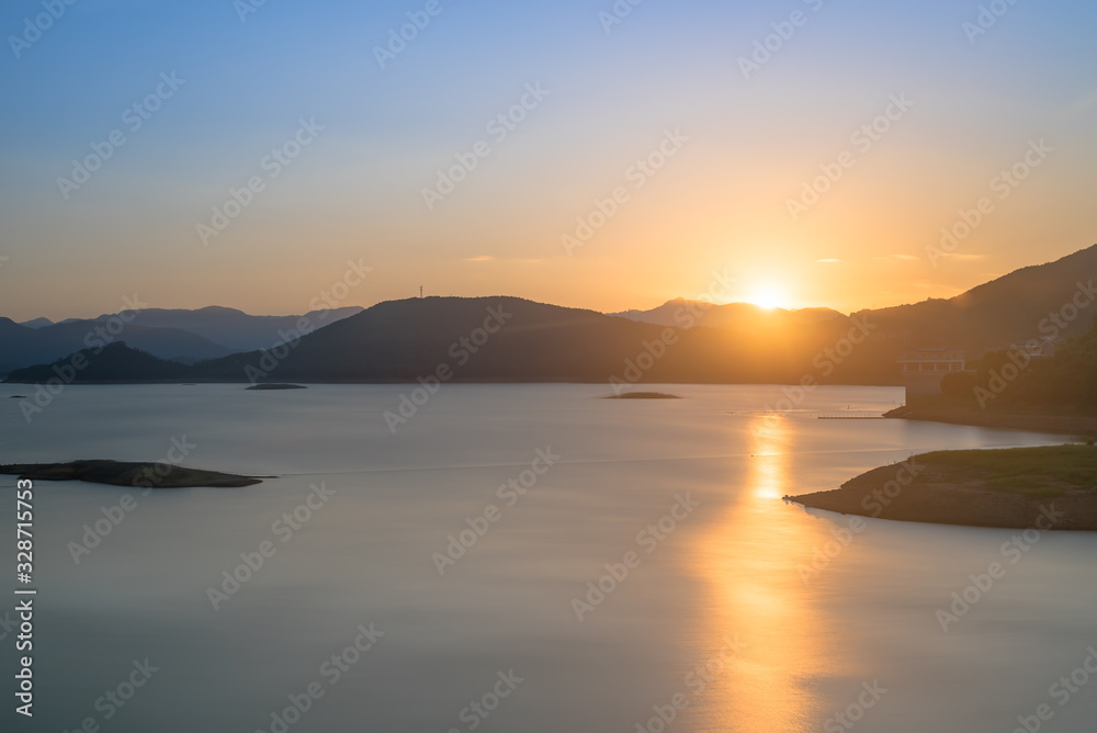 The reflection of the shape of the mountain on the lake The reflection of the shape of the mountain on the lake