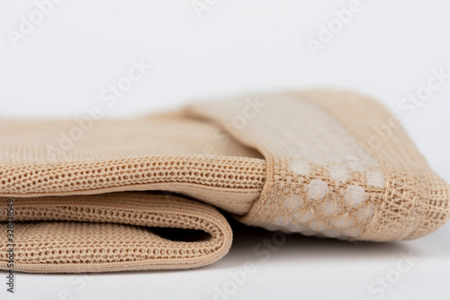 Close up of flat knit Graduated Compression Garments for leg lymphedema, edema and lipedema - powerful compression stocking for greater edema containment