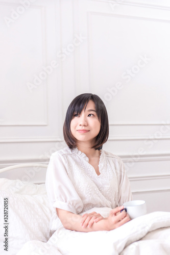 Portrait of beautiful asian young woman sleep lying in bed with head on pillow comfortable and happy with leisure  girl with relax for health and lifestyle concept.