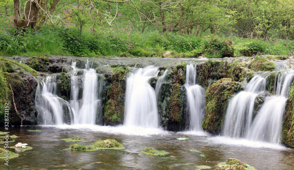 Waterfall in Lathkill Dale, Derbyshire Waterfall in Lathkill Dale, Derbyshire
