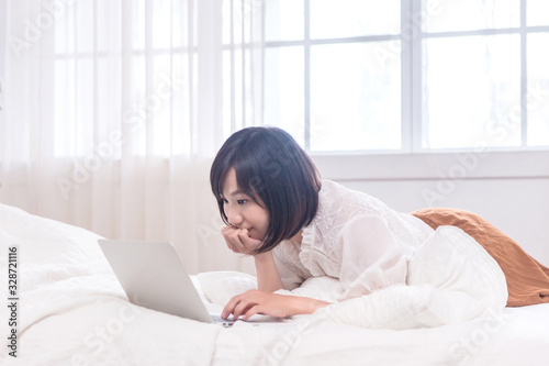 Portrait of beautiful asian young woman sleep lying in bed with head on pillow comfortable and happy with leisure, girl with relax for health and lifestyle concept.