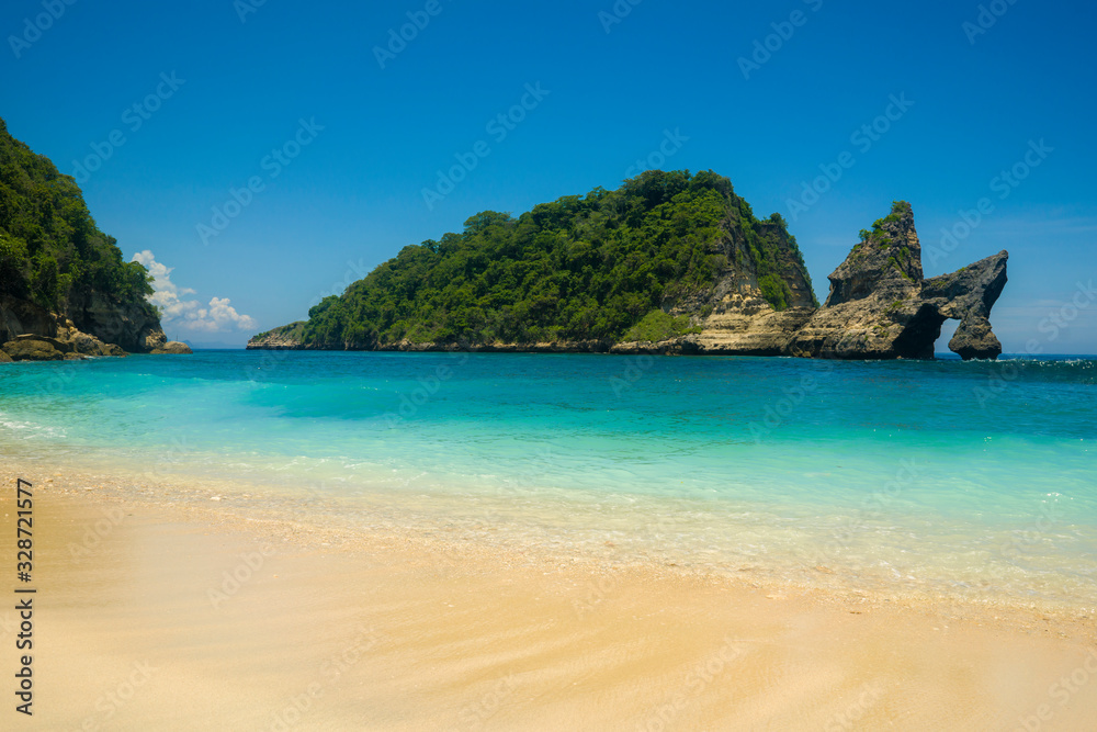 beautiful scenic view of rock cliff in the sea at the exotic and relaxing Atuh beach tropical paradise at unique Summer holidays travel in relax and tourism concept
