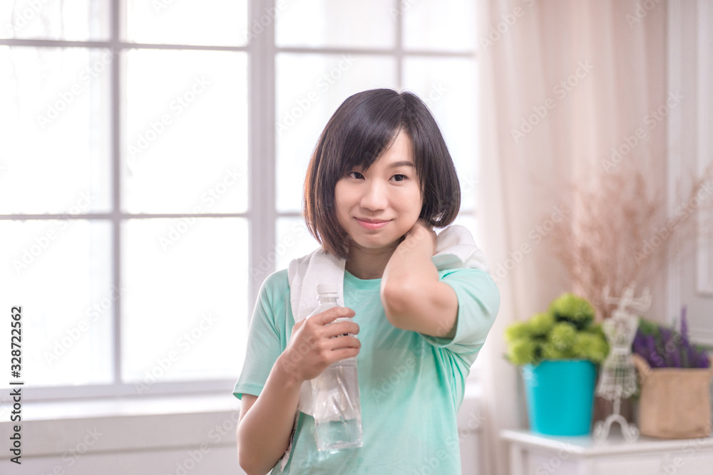 Beautiful Asian girl, Fit sportswoman exercising and training at home Beautiful Asian girl, Fit sportswoman exercising and training at home