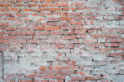 The texture of the brickwork from the old red brick. The outer part of the wall.