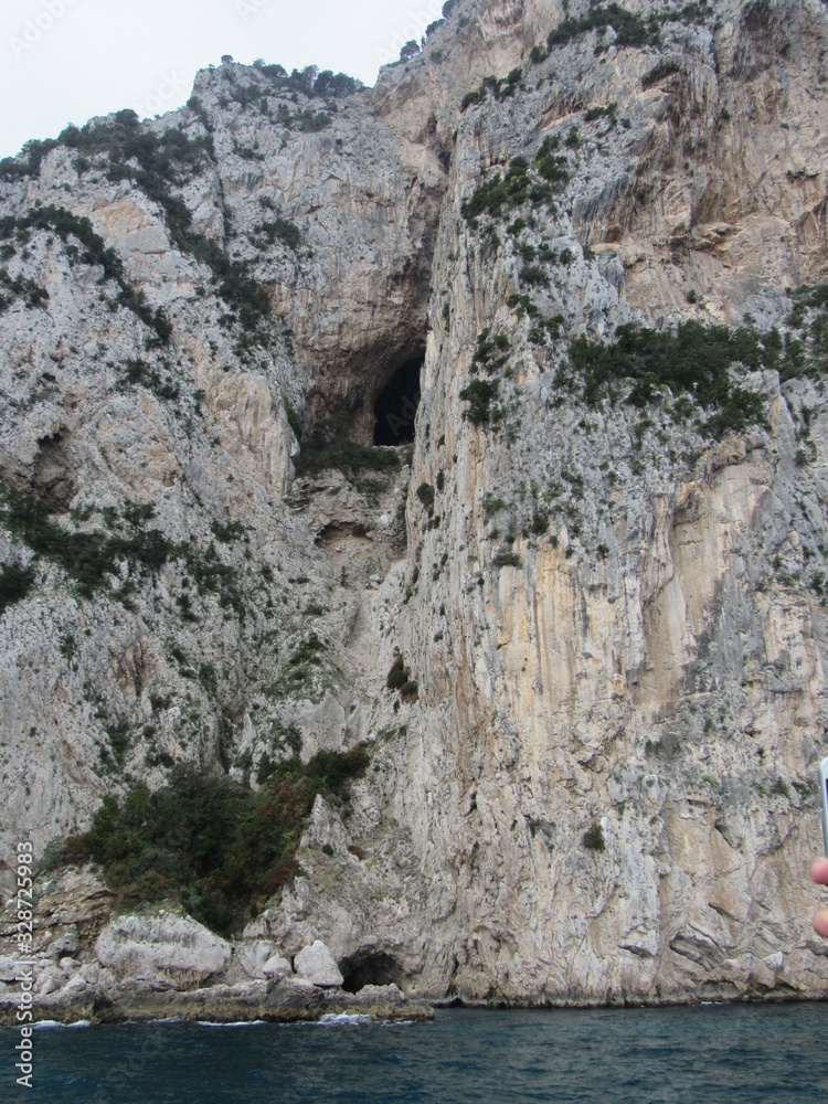 View of the cave and cliff near Emperor Tiberius' Villa Jovis, which is believed to have been an execution spot, on Capri, Italy