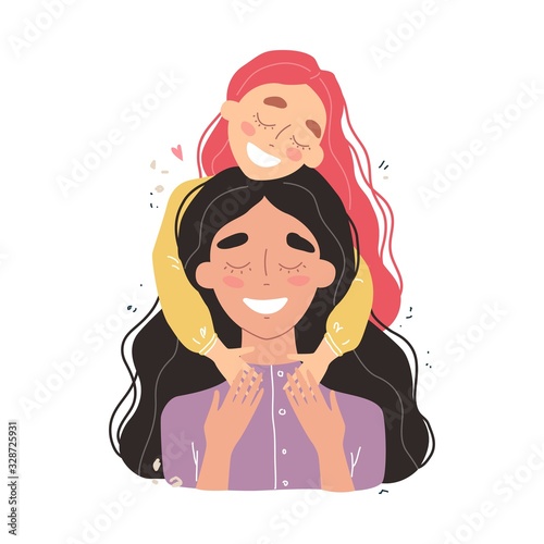 Beautiful young woman and her charming little daughter. Girl hugs mom and smiles