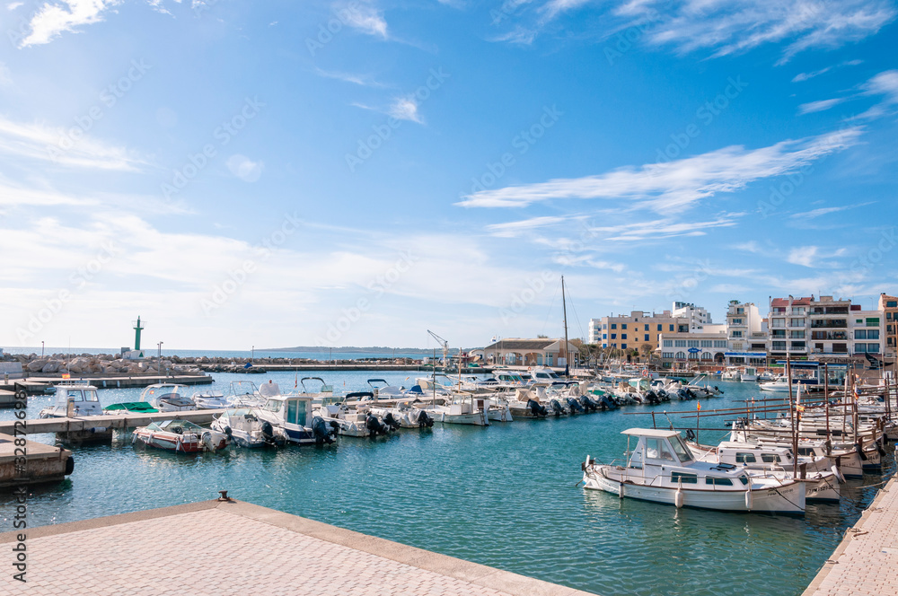 General view of a small recreational port on a sunny day Cala Bona, island of Mallorca, Spain