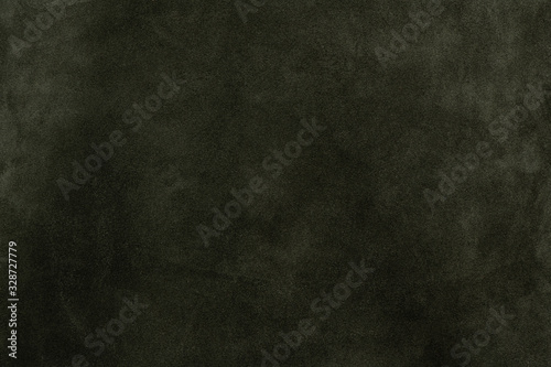 Dark green natural suede leather soft touch textured background