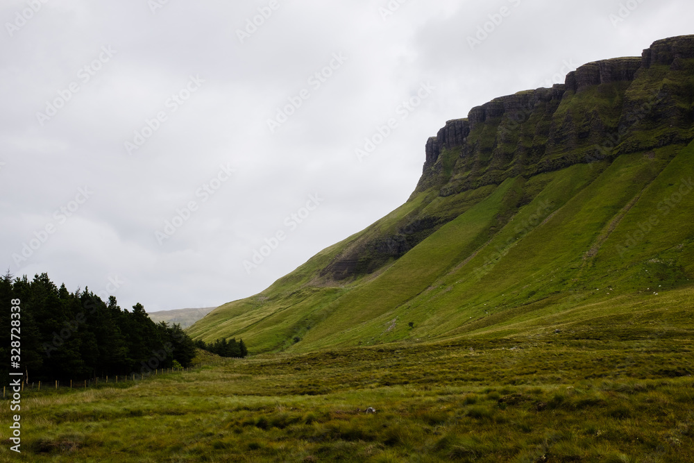Mount Benbulben in the County Sligo, Ireland, on a cloudy day Mount Benbulben in the County Sligo, Ireland, on a cloudy day