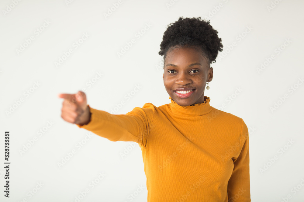 beautiful young african woman on white background with hand gesture beautiful young african woman on white background with hand gesture