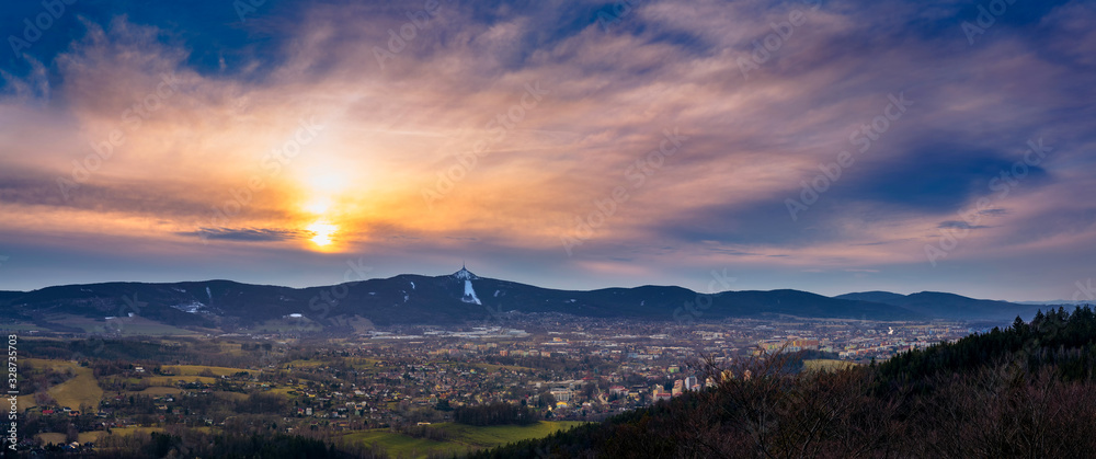Sunrise sunse over the city of Liberec, Czech republic. Jested. View from the view Prosec, Jested Mountain.