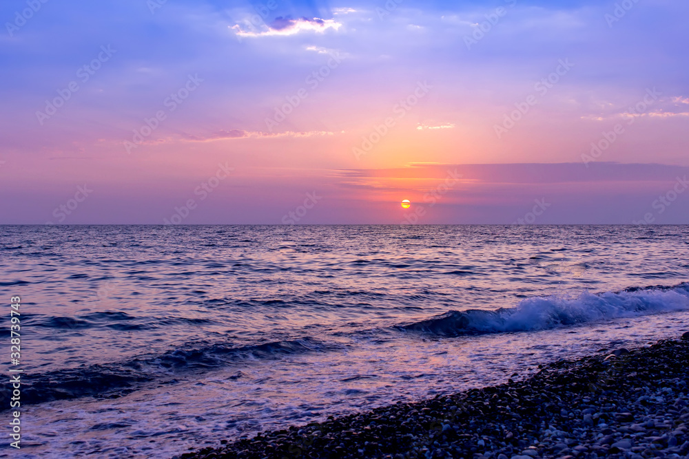 Beautiful sea sunset with pink colors. Summer landscape.