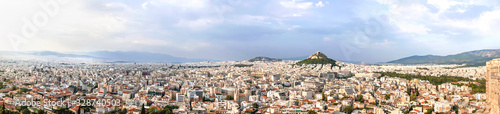Panoramic image of Athens from Acrpoli hill on evening sun. © pirke