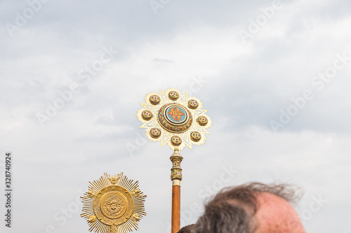 Large richly inlaid symbol from festive procession in honor of Epiphanius on the Baptismal Site of Jesus Christ on the Jordan River near Jericho in Israel photo