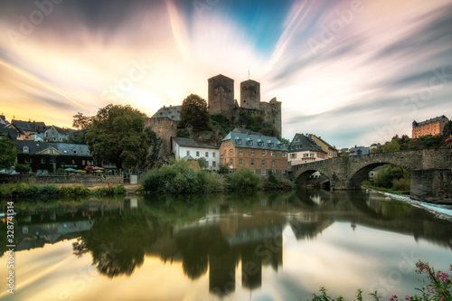 runkel Germany, right on the beautiful river Lahn. with a weir great reflection and long exposure. everything in the evening at sunset and with a great castle ruin