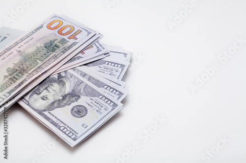 Dollars on a white background, with space for text, with copy space. Concept backgrounds for financial topics, savings and salary.