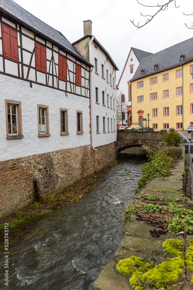 Historic buildings and Erft river in Bad Muenstereifel