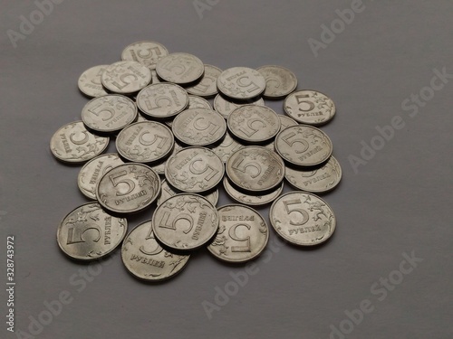 Pile of five rubles coins.