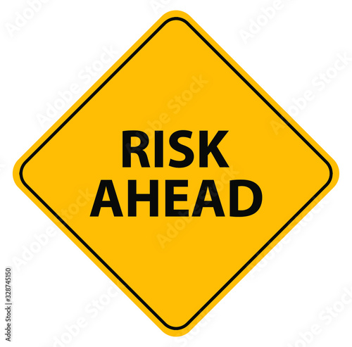 Fotografija risk ahead sign on white background