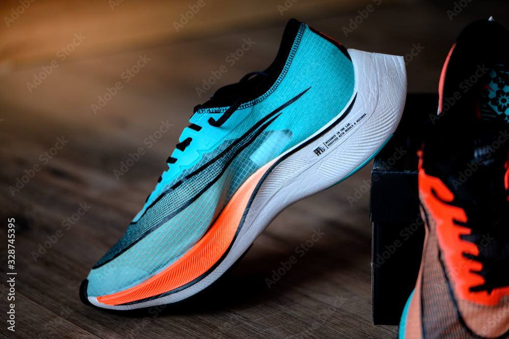 BANGKOK, THAILAND, MARCH 7. 2020: Nike running shoes Vaporfly NEXT%. Controversial Athletics marathon shoe, Ekiden Color version, Detail view Zoom foam and Nike Flyknit uppers, Stock Photo | Adobe Stock