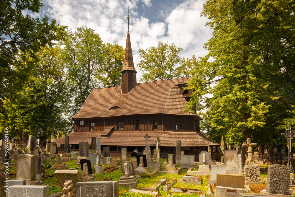 Church of the Virgin Mary in Broumov during beautiful sunny day with blues sky – The oldest wooden church in  Czech Republic and second oldest in Europe