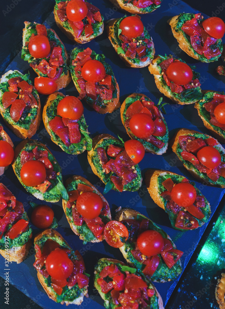 Fototapeta premium Catering and guest meals during the event. Quick mini snacks in a special beautiful dish.