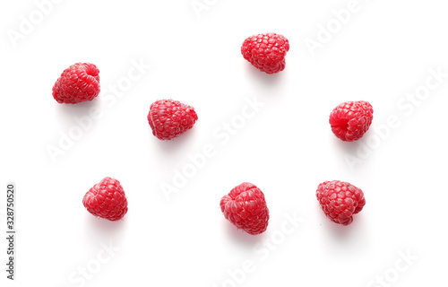Group of fresh raspberries isolated on white. Top view