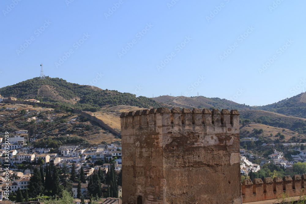 Tower of the Cubo (Torre del Cubo), watch and arms towers of Alcazaba fortress at the historical Alhambra Palace complex in Granada, Andalusia, Spain.