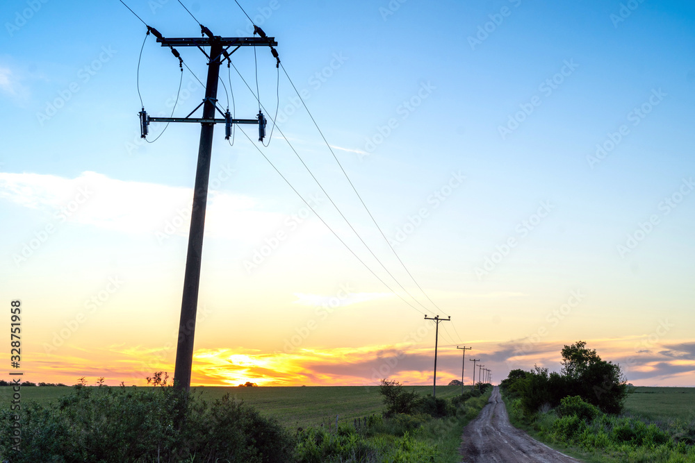 Rural electrification is the process of bringing electrical power to rural and remote areas.  - obrazy, fototapety, plakaty 